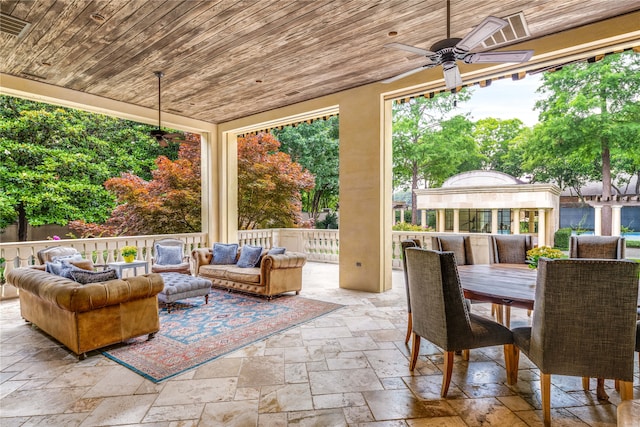 view of patio featuring an outdoor living space and ceiling fan