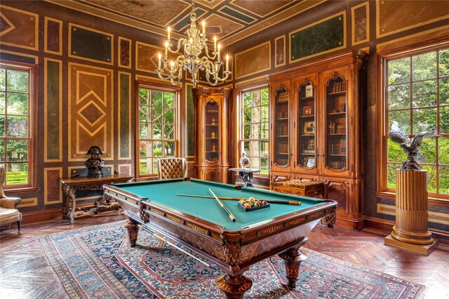 playroom featuring dark parquet flooring, a chandelier, and billiards