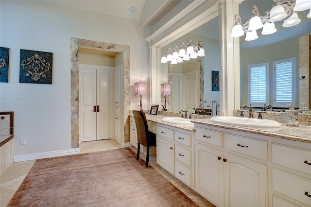 bathroom with vanity and tile patterned floors