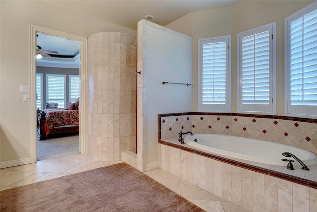 bathroom featuring tile patterned floors, independent shower and bath, and plenty of natural light