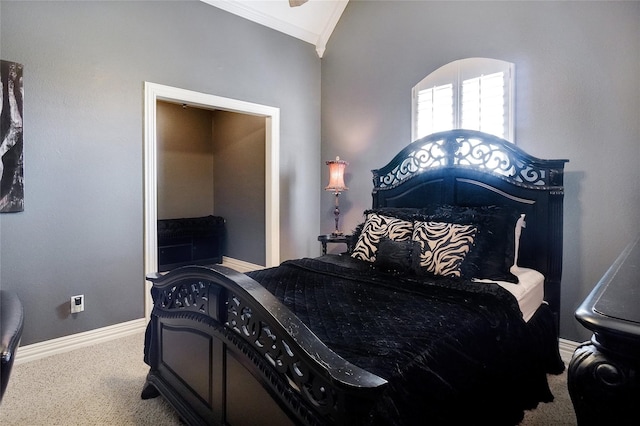 carpeted bedroom with ornamental molding and lofted ceiling