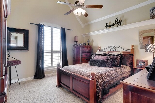 bedroom featuring lofted ceiling, light carpet, ornamental molding, and ceiling fan