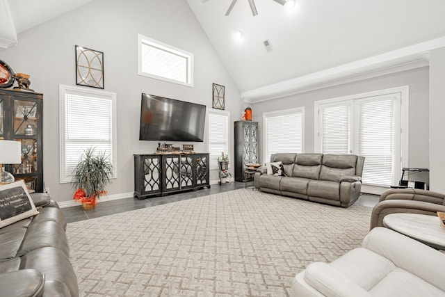 living room featuring high vaulted ceiling, ceiling fan, and a healthy amount of sunlight