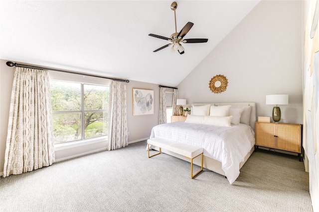 bedroom featuring ceiling fan, carpet, and high vaulted ceiling