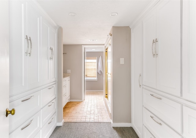 bathroom with tile patterned floors