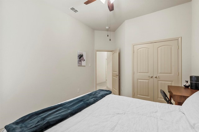 bedroom featuring a ceiling fan, a closet, and visible vents