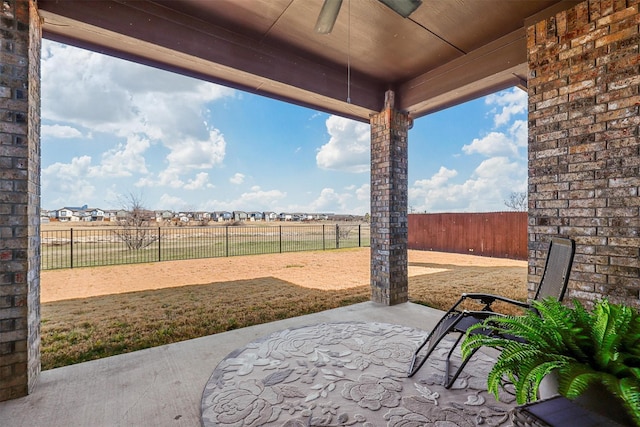 view of patio / terrace featuring a fenced backyard and ceiling fan