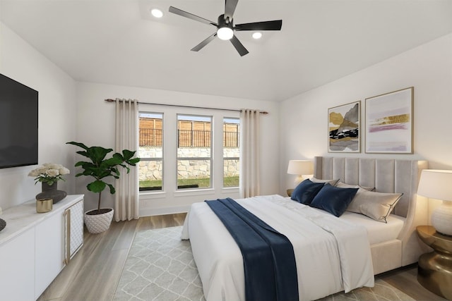 bedroom featuring recessed lighting, light wood-style floors, and ceiling fan