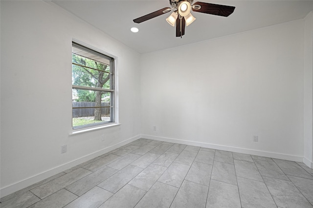 unfurnished room with ceiling fan