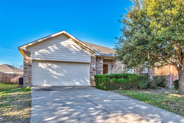 single story home with a garage