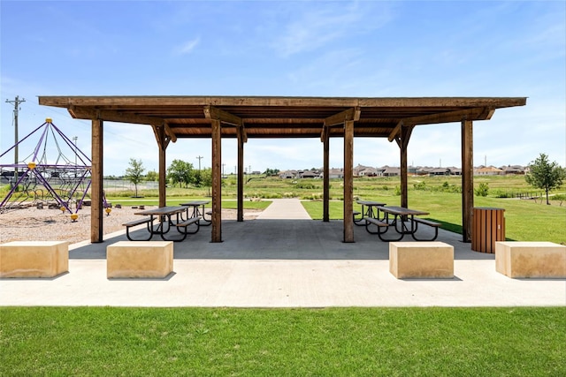 surrounding community featuring a patio and a yard