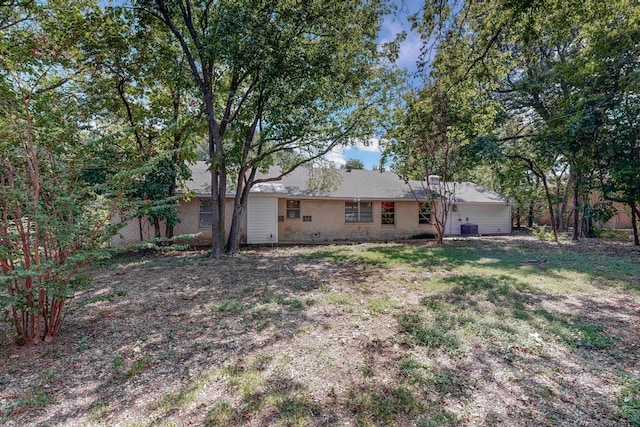 view of front of home with cooling unit