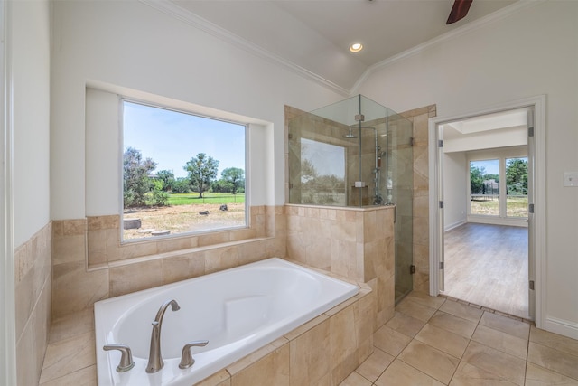 bathroom featuring tile patterned flooring, plus walk in shower, and ornamental molding