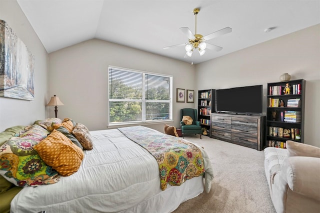 carpeted bedroom featuring ceiling fan and vaulted ceiling