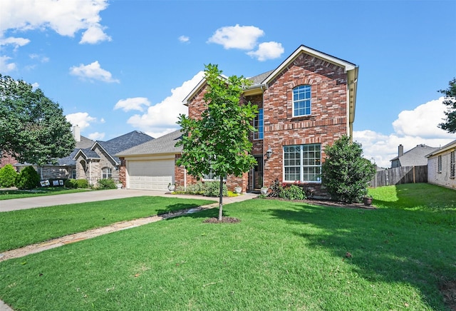 view of front of property with a garage and a front lawn