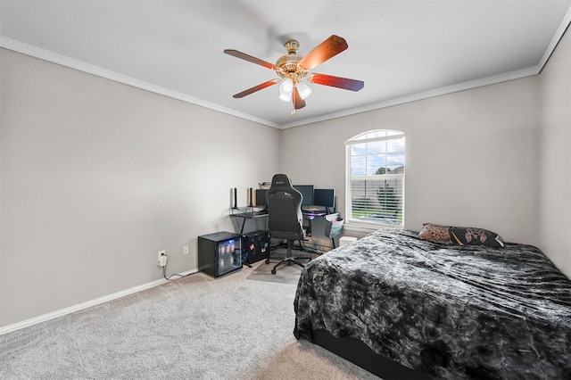 bedroom featuring ceiling fan, carpet floors, and ornamental molding