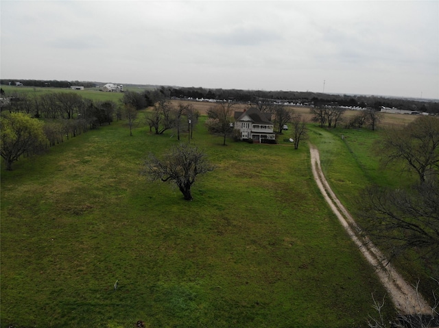 birds eye view of property featuring a rural view