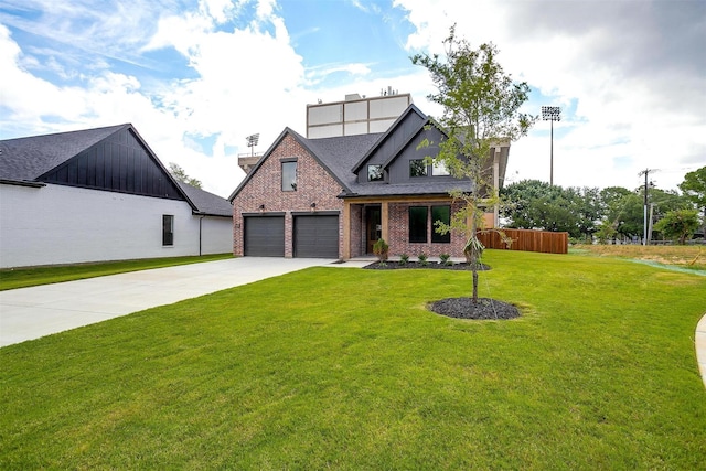 view of front facade featuring a garage and a front yard