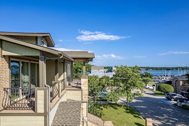 view of side of property featuring a water view