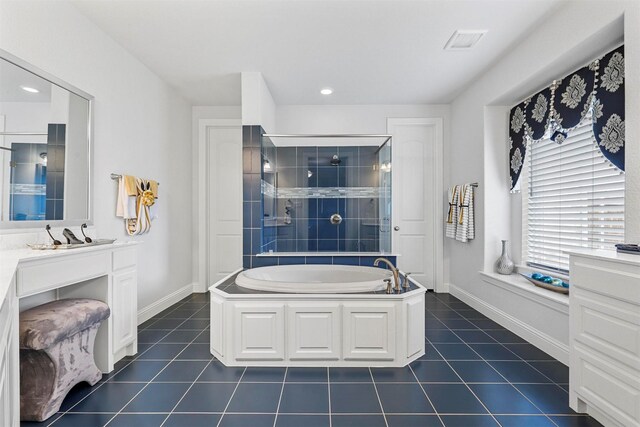 bathroom featuring baseboards, visible vents, tile patterned floors, and a stall shower