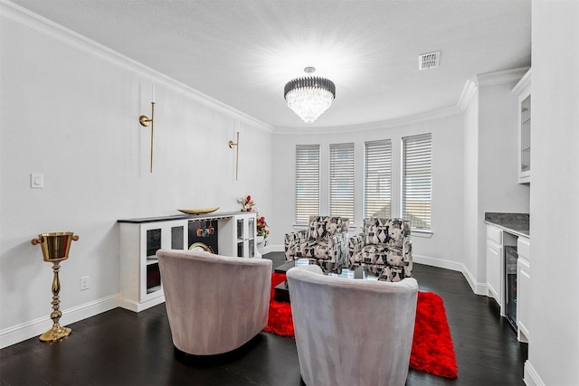 dining space featuring crown molding, a chandelier, and dark hardwood / wood-style floors