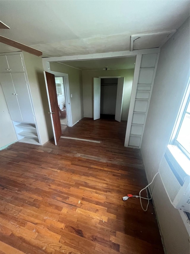 unfurnished room featuring hardwood / wood-style floors