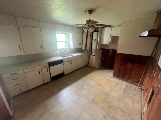 kitchen featuring ceiling fan, dishwasher, sink, gas water heater, and white cabinets