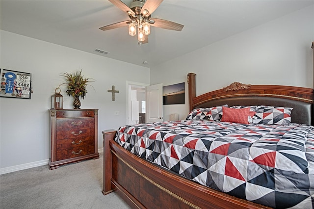 bedroom featuring ceiling fan and light colored carpet