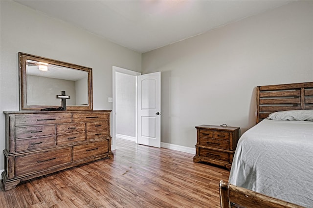 bedroom featuring wood-type flooring