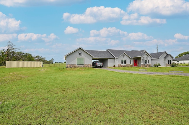 single story home with a front yard