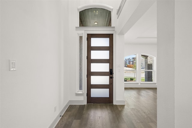 entryway with hardwood / wood-style floors