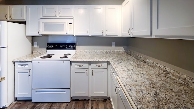 kitchen featuring white cabinetry, light stone counters, white appliances, and dark hardwood / wood-style flooring