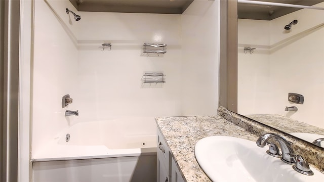 bathroom featuring vanity and shower / washtub combination