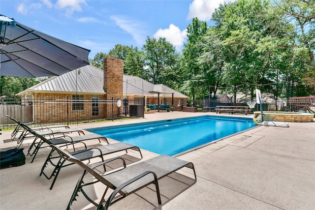 view of pool with a patio