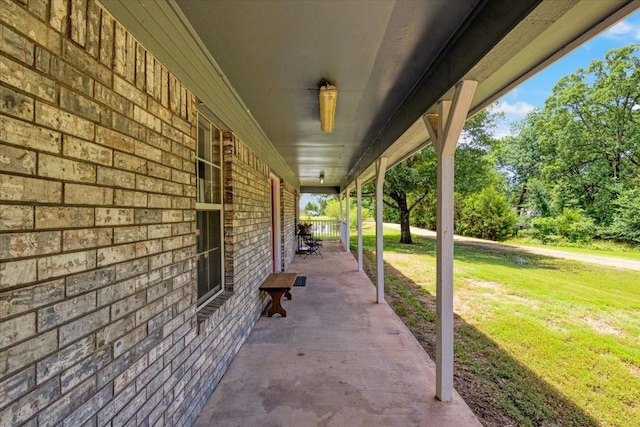 view of patio featuring a porch