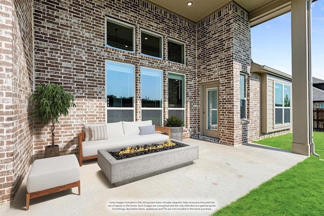 view of patio / terrace with a fire pit