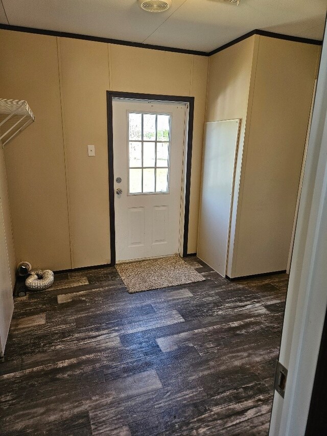 doorway featuring dark hardwood / wood-style flooring