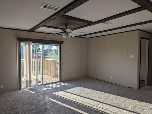 carpeted spare room with ceiling fan