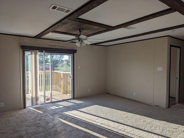 empty room with visible vents, ceiling fan, and carpet floors