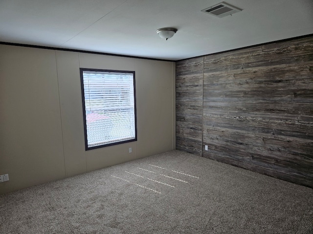 spare room featuring carpet flooring