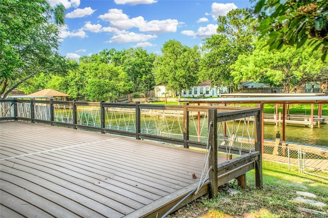 deck featuring a water view