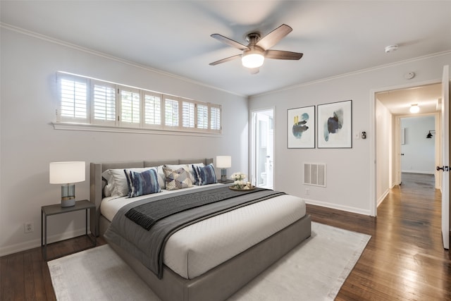 bedroom with ceiling fan, dark hardwood / wood-style flooring, and ornamental molding