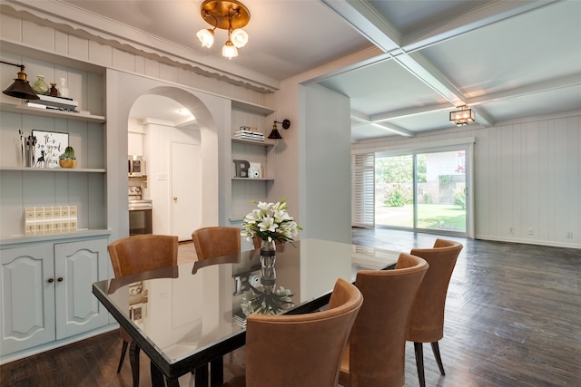 dining room with beamed ceiling, ornamental molding, dark hardwood / wood-style flooring, and coffered ceiling