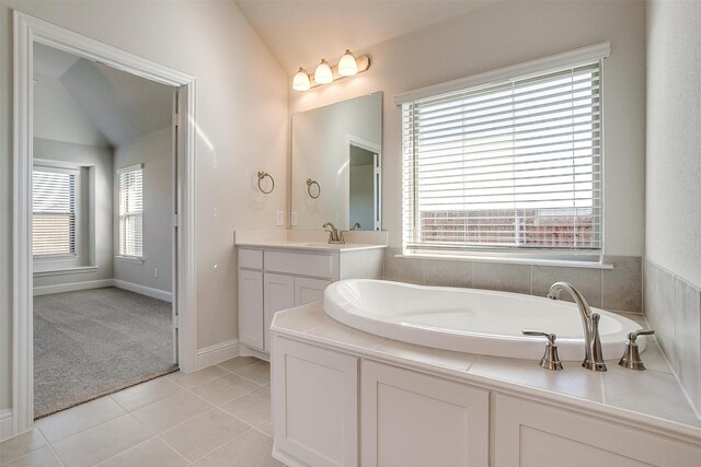 bathroom with vanity, tile patterned floors, and ceiling fan