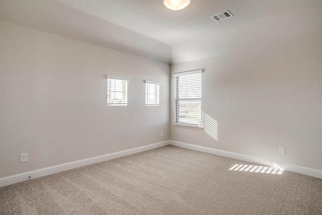 view of carpeted spare room