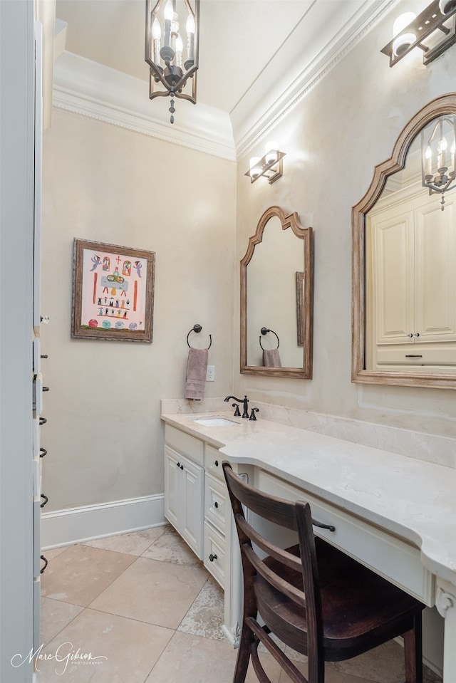 bathroom with tile patterned floors, crown molding, vanity, and a chandelier