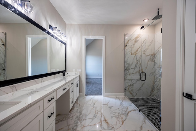 bathroom featuring vanity and an enclosed shower