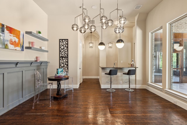 interior space with dark hardwood / wood-style flooring