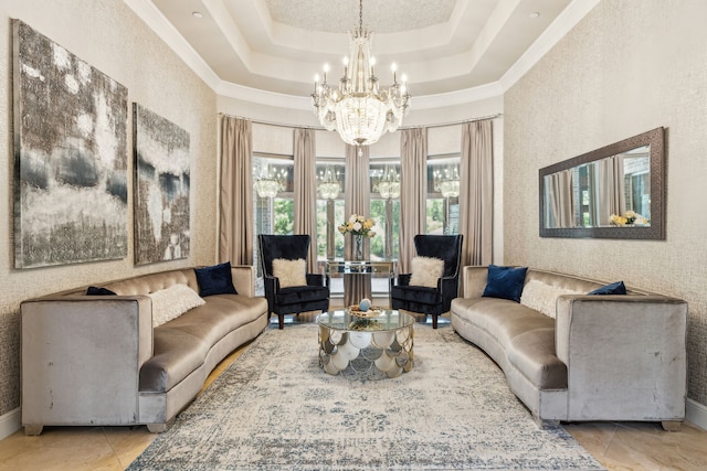 tiled living room featuring a chandelier, ornamental molding, and a raised ceiling