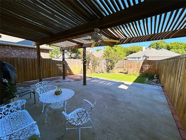 view of patio / terrace with ceiling fan and a pergola